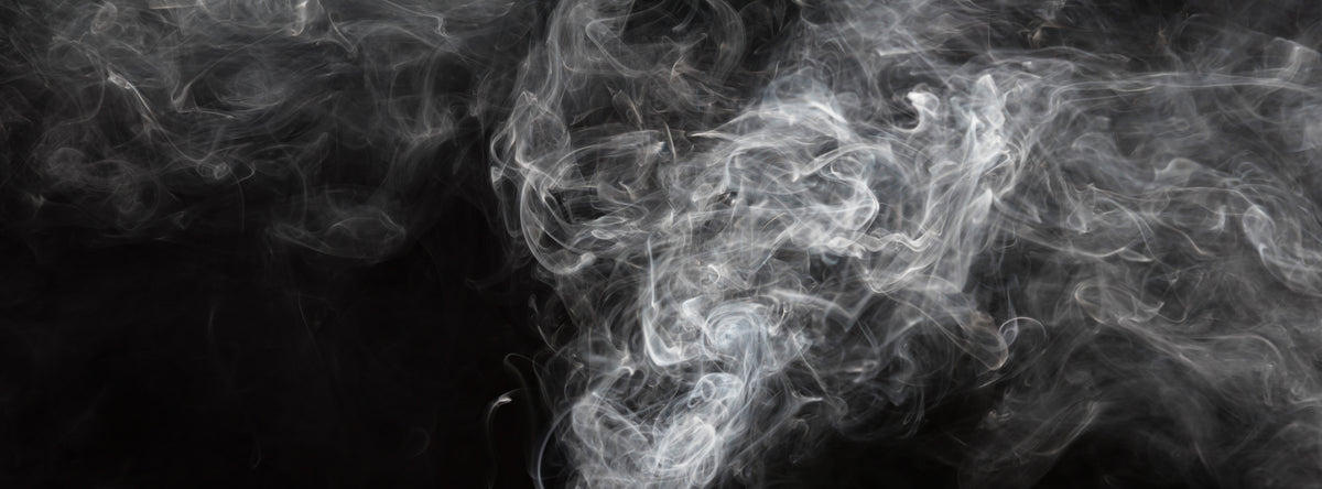 What materials are never ever safe to cut in a CO2 laser?