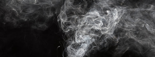 What materials are never ever safe to cut in a CO2 laser?